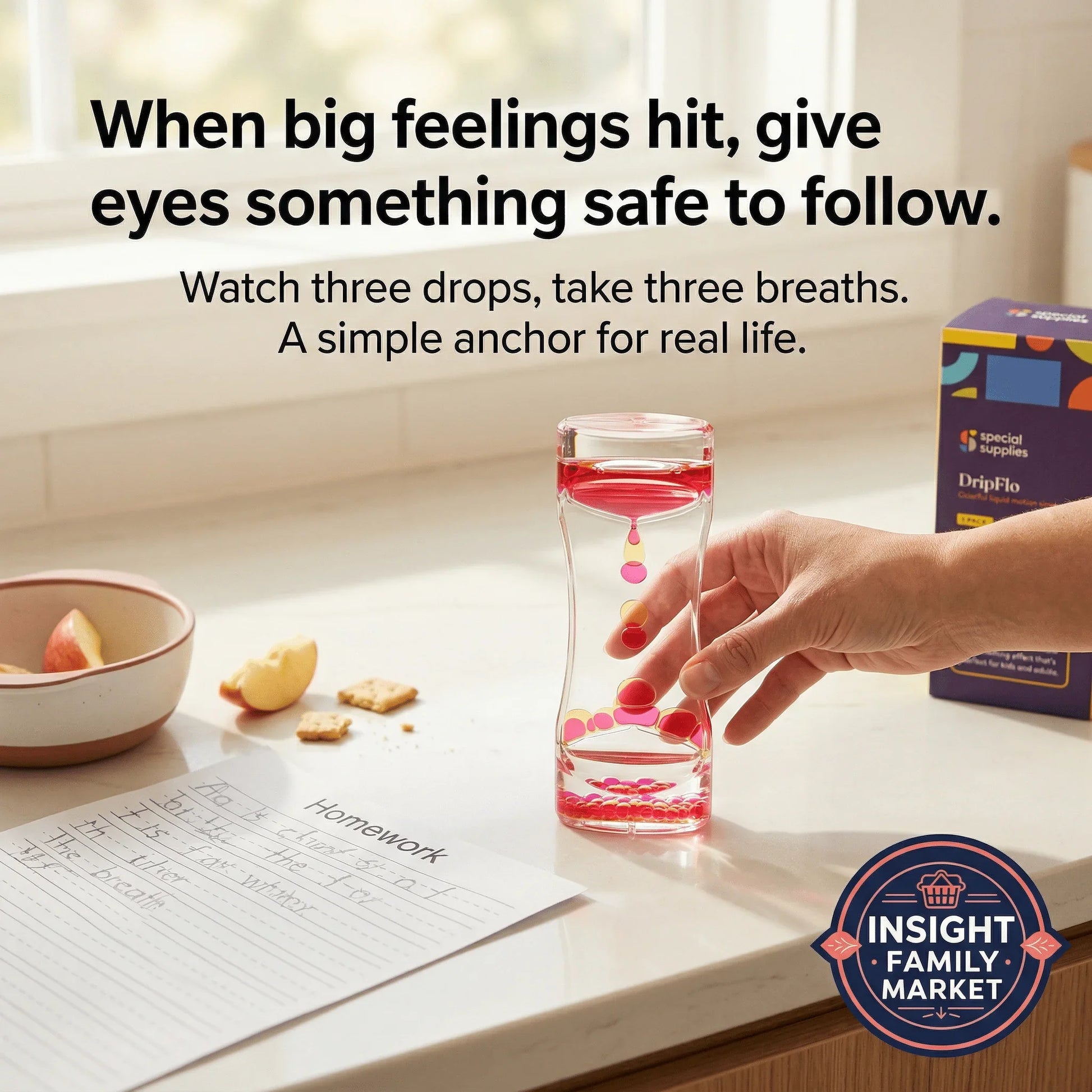 Hand using sensory liquid timer for focus, with homework and snacks on kitchen counter