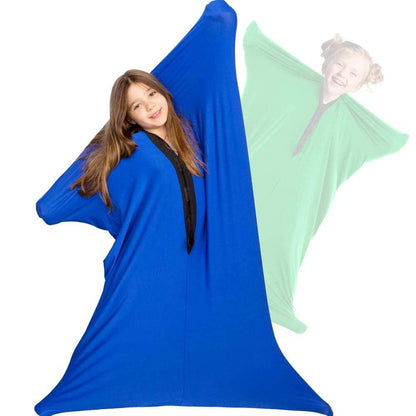 Child wearing blue sensory body sock stretching fabric, sensory tool for kids