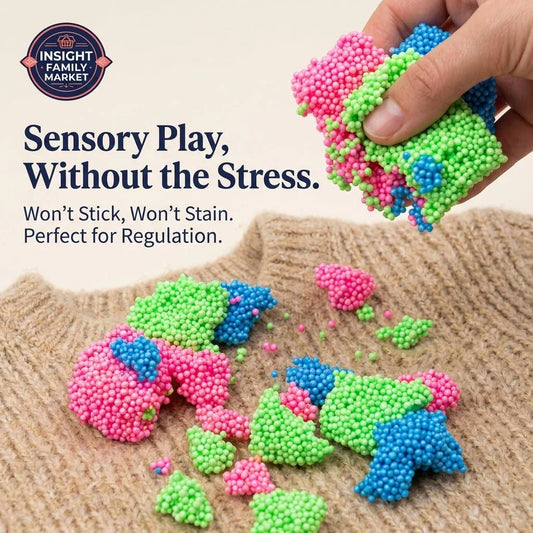 Sensory play foam balls in pink, green, and blue on a sweater and hand, mess-free sensory toy.