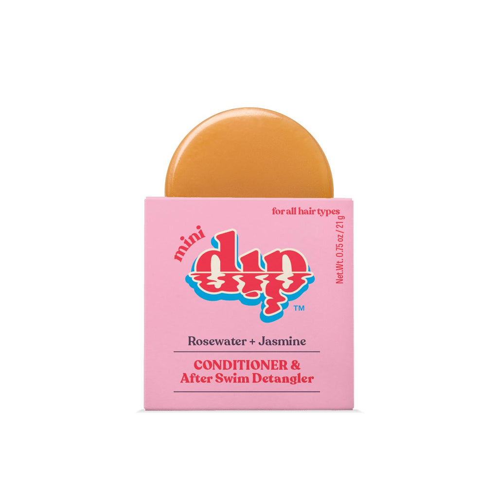 Bar of soap with pink packaging on a white background