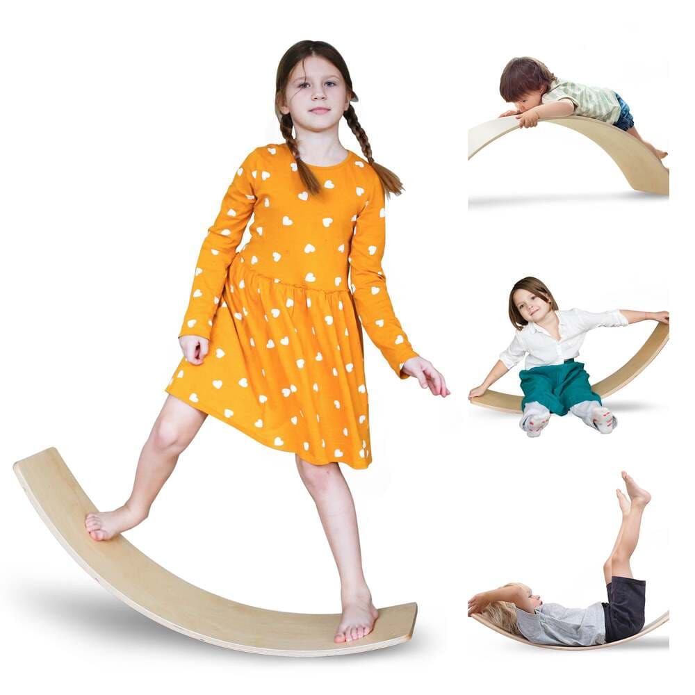 Children playing on a wooden balance board with a girl in an orange dress standing on it.