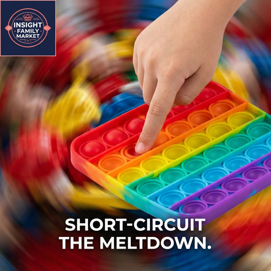 Colorful pop-it toy with a child's hand pressing it, surrounded by blurred colorful objects.