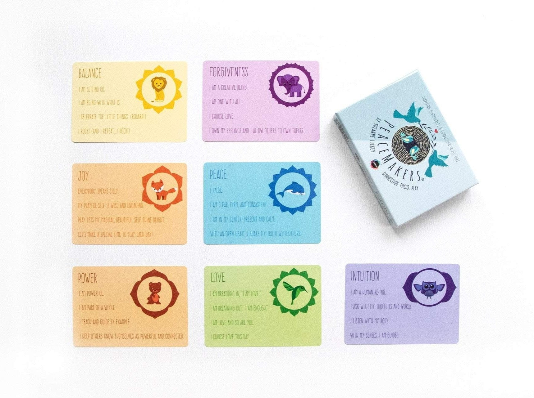 Set of colorful cards with symbols and text on a white background