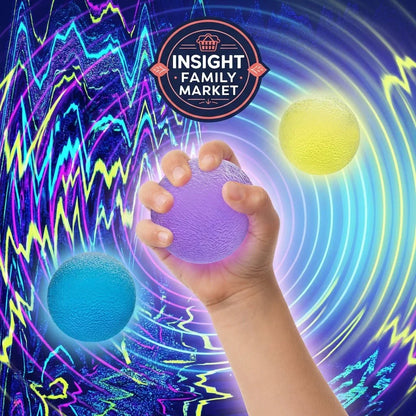 Hand squeezing purple sensory stress ball with blue and yellow sensory balls, abstract background.