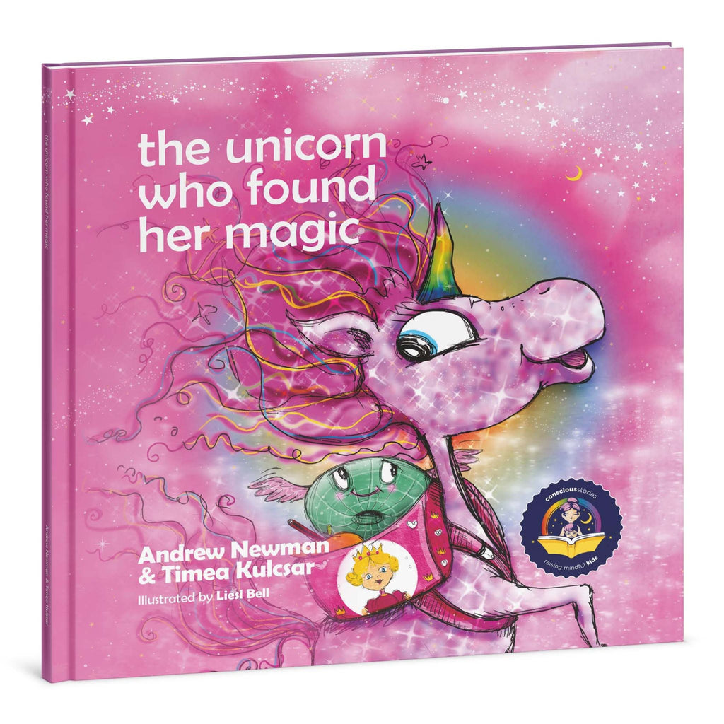 Book titled 'the unicorn who found her magic' with a colorful unicorn illustration on a pink background.
