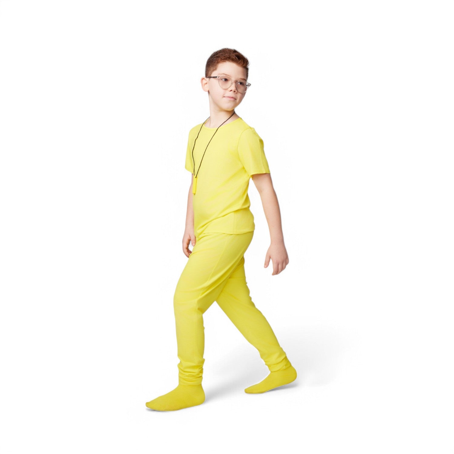 Person wearing a bright yellow outfit on a white background