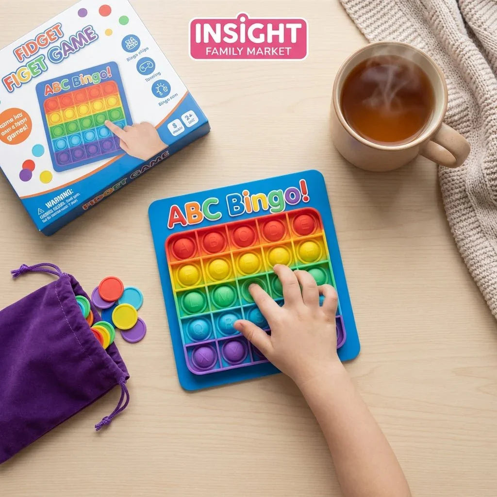 Child playing ABC Bingo sensory fidget game with rainbow pop board and colorful chips on table