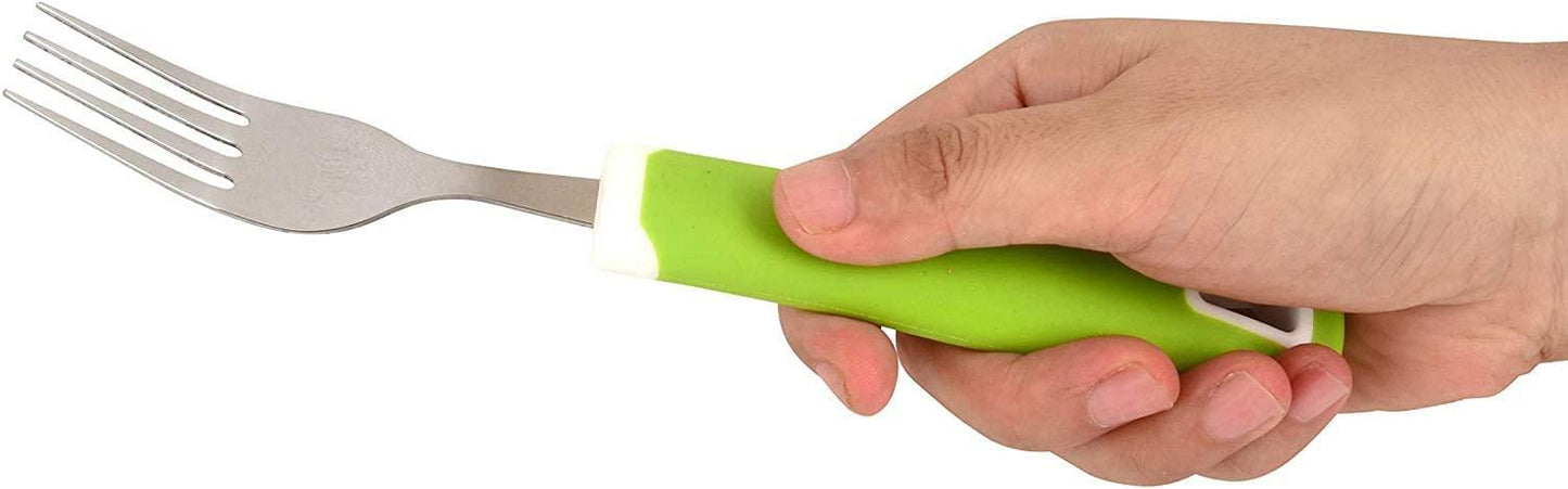 Adaptive fork with green ergonomic handle held in a right hand