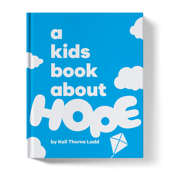 Children's book cover titled 'A Kids Book About Hope' with clouds and a kite on blue background