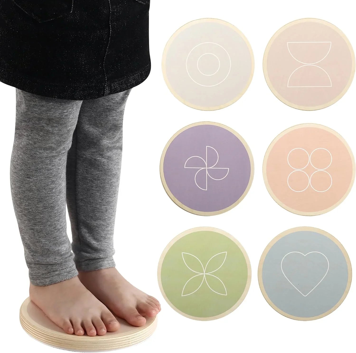 Child standing on sensory balance disc, with six pastel sensory stepping stones shown.