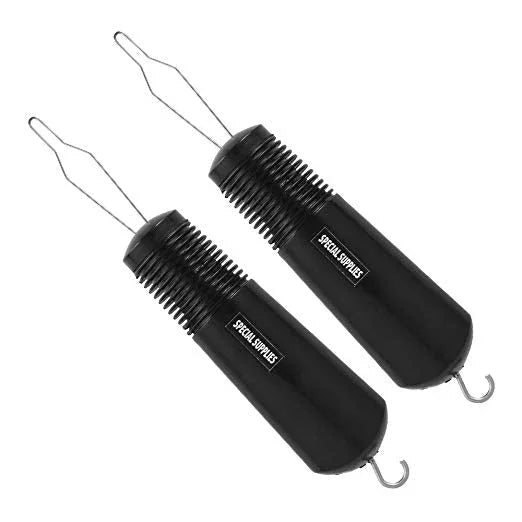Pair of black sensory brush tools with metal hooks and textured handles