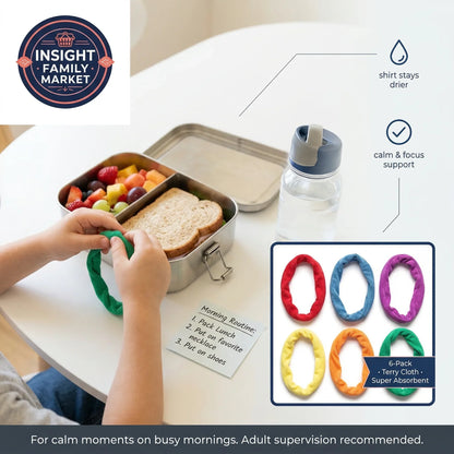 Child packing a lunch with a bento box, fruit, and sandwich on a table with Insight Family Market branding.