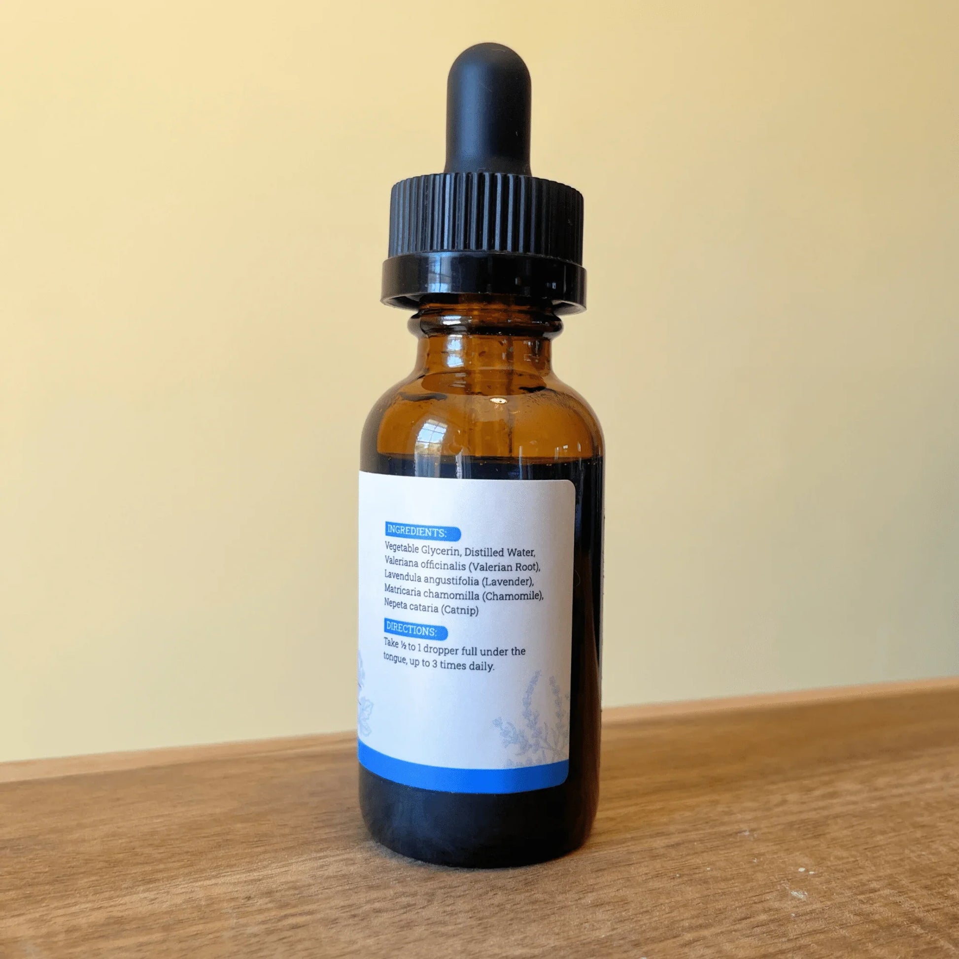 Amber glass dropper bottle of herbal tincture for natural calming and relaxation support