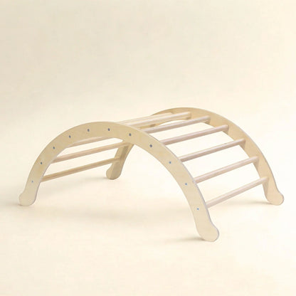 Wooden Pikler climbing arch for sensory play and motor skill development on neutral background