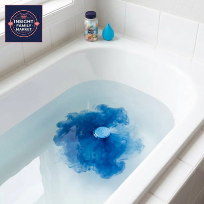 Blue bath bomb dissolving in tub, with sensory-friendly bath products on ledge