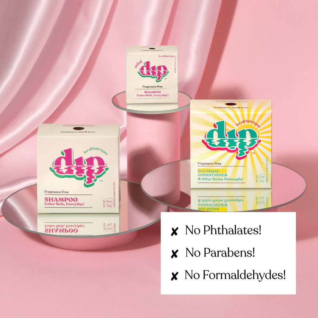 Dip hair care product boxes on a pink background with 'No Phthalates!', 'No Parabens!', and 'No Formaldehydes!' text.