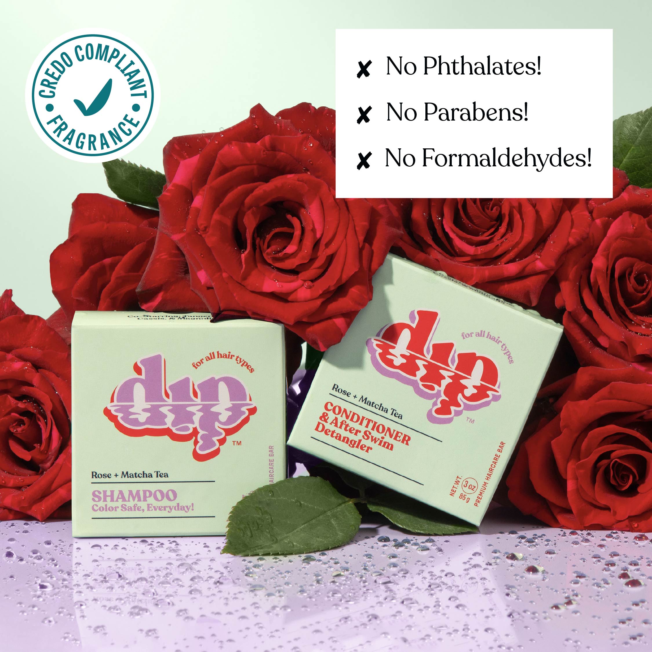 Two boxes of 'dip' shampoo and conditioner with red roses in the background, featuring a Credio Compliant Fragrance label and allergen-free声明.