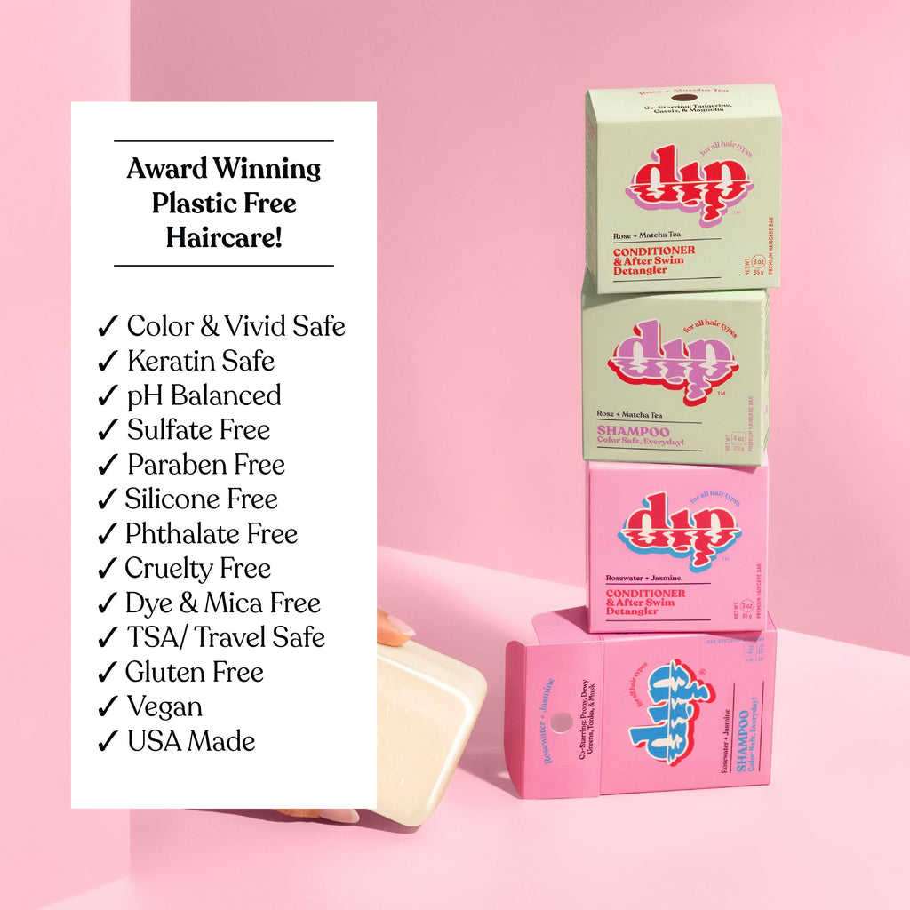 Stack of 'dip' hair care product boxes with a list of benefits on a pink background