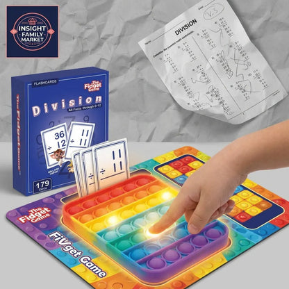 Child playing division flashcard fidget game with colorful sensory board and math worksheet