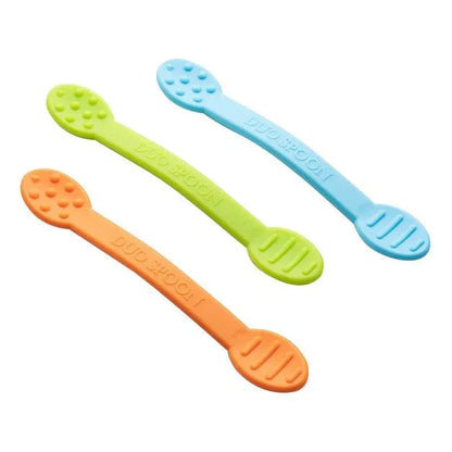 Three silicone sensory spoons in blue, green, and orange with textured ends.