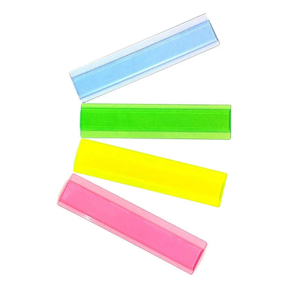 Set of four colorful reading guide strips in blue, green, yellow, and pink on white background