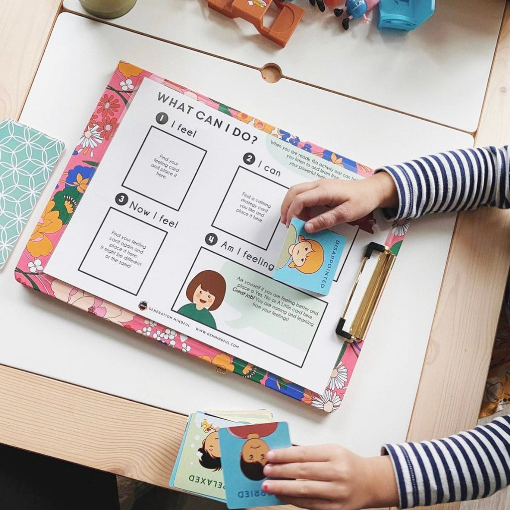 Child interacting with educational materials on a table