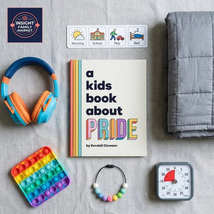 Kids' ADHD and sensory starter pack with headphones, fidget toy, weighted blanket, timer, visual schedule, book about pride, and chewable bracelet.