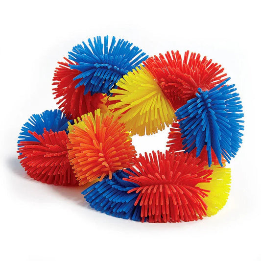 Colorful sensory fidget toy with red, yellow, and blue hairy textured segments