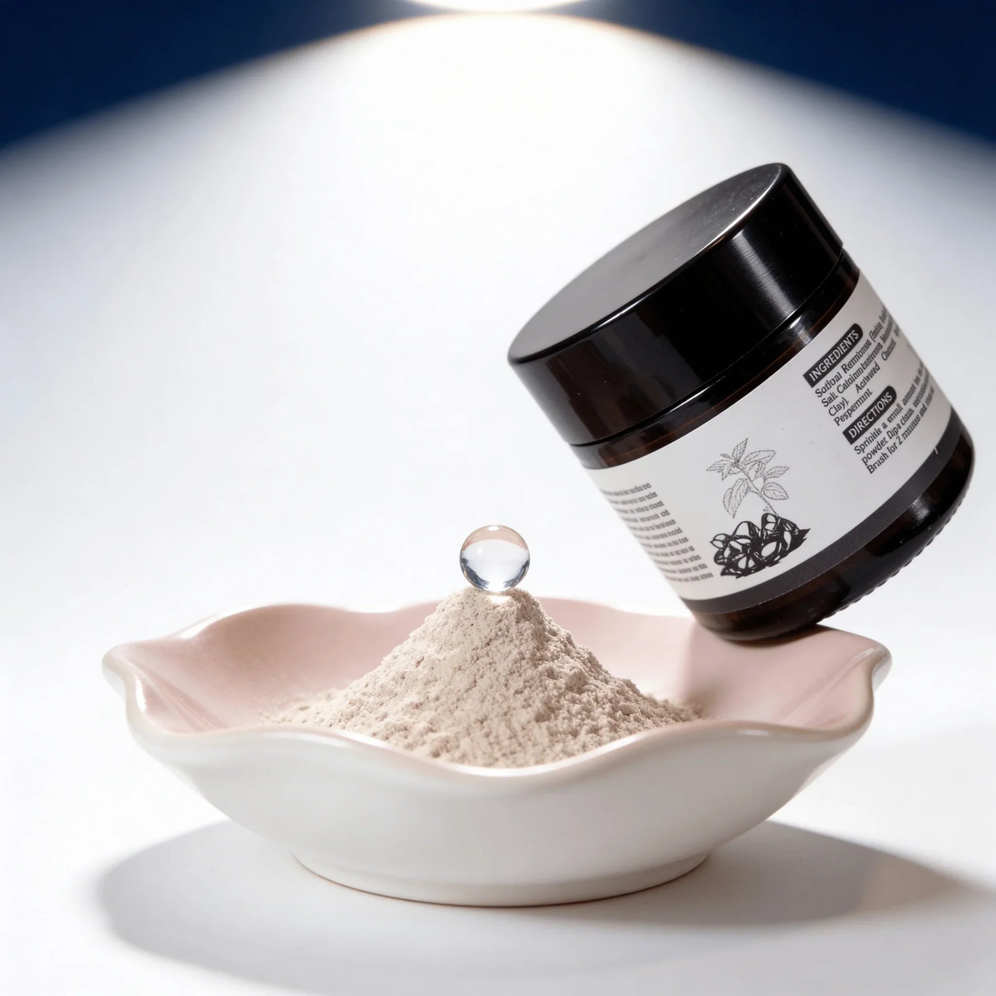 Nutritional supplement powder in a bowl with jar, featuring a water droplet on top