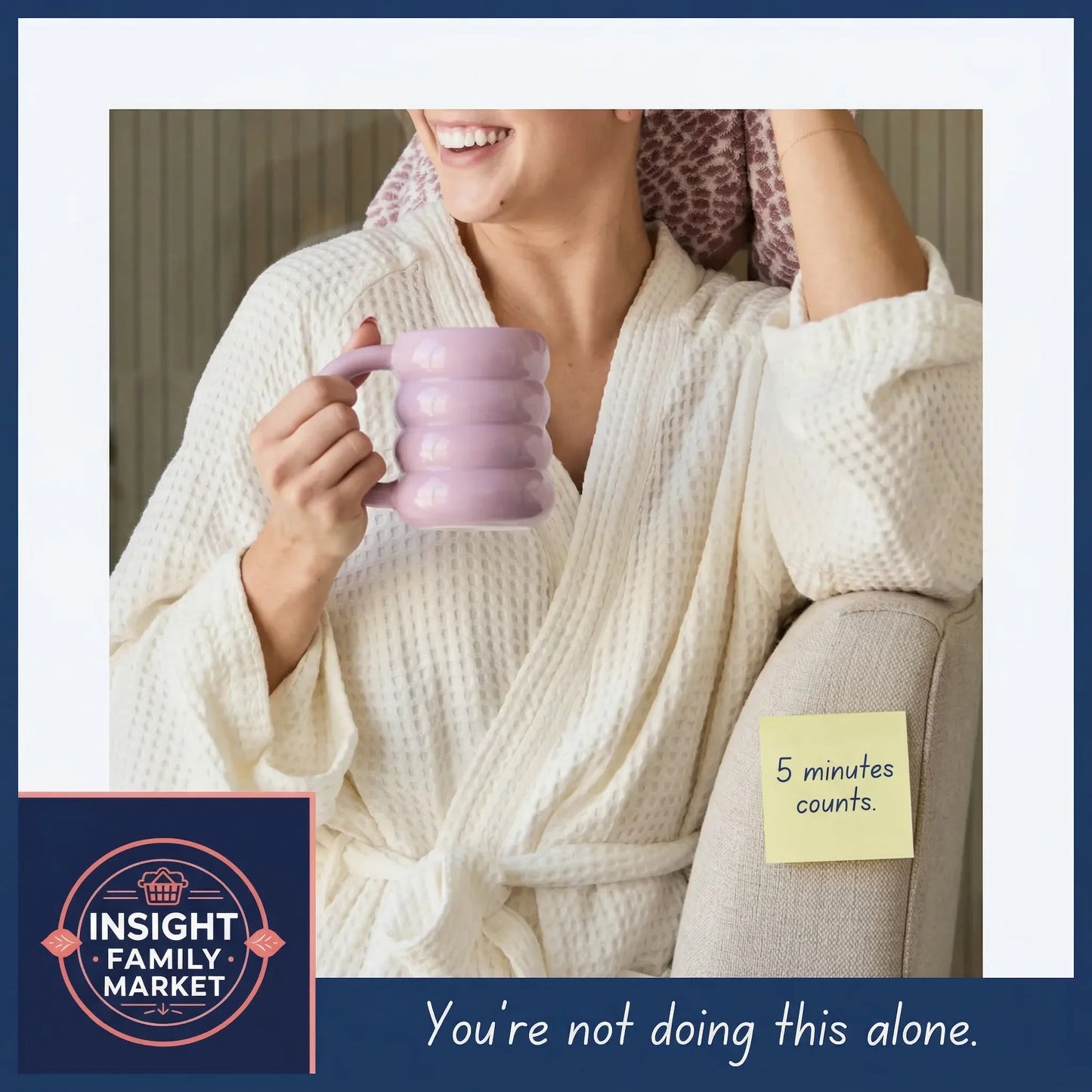 Person in a robe holding a pink mug with a 'Insight Family Market' logo and text.