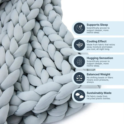 Close-up of chunky knit cooling weighted blanket in silver grey with benefits listed beside it.