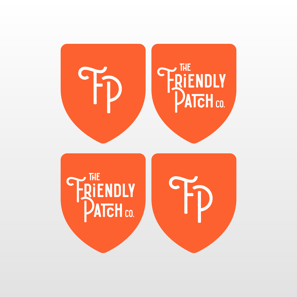 Four orange patches with 'The Friendly Patch Co.' branding on a light gray background