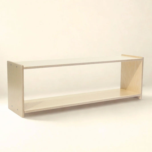 Natural wood Montessori infant shelf with open design and rounded edges on white background