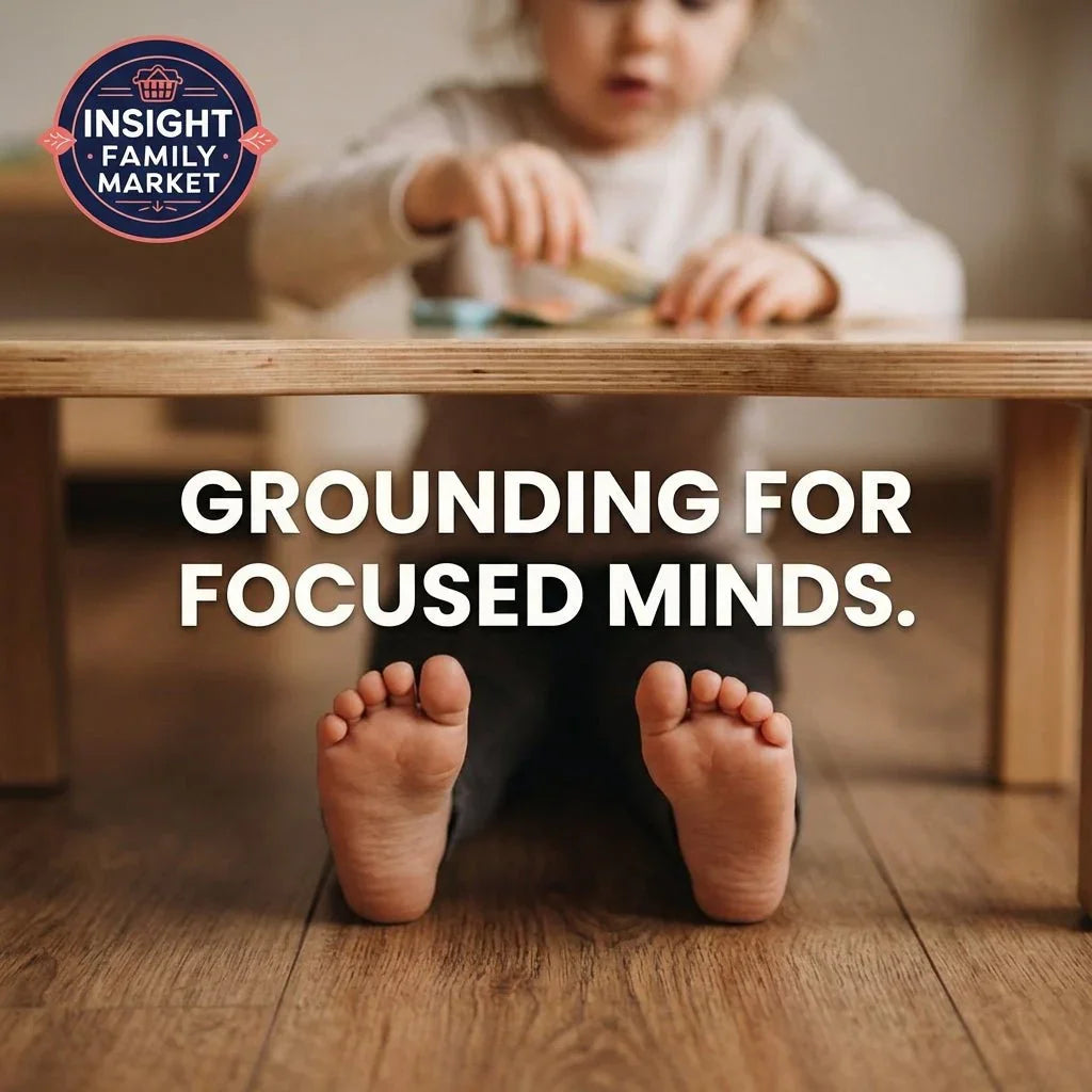 Child sitting barefoot under table, playing with toys, text reads 'Grounding for Focused Minds'