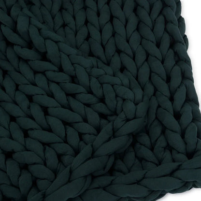 Closeup of chunky knit forest green sensory-friendly weighted blanket