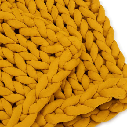 Closeup of chunky knit marigold yellow weighted blanket, soft sensory-friendly texture
