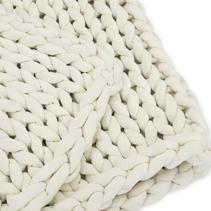 Closeup of cream chunky knit sensory blanket, soft woven texture for sensory support