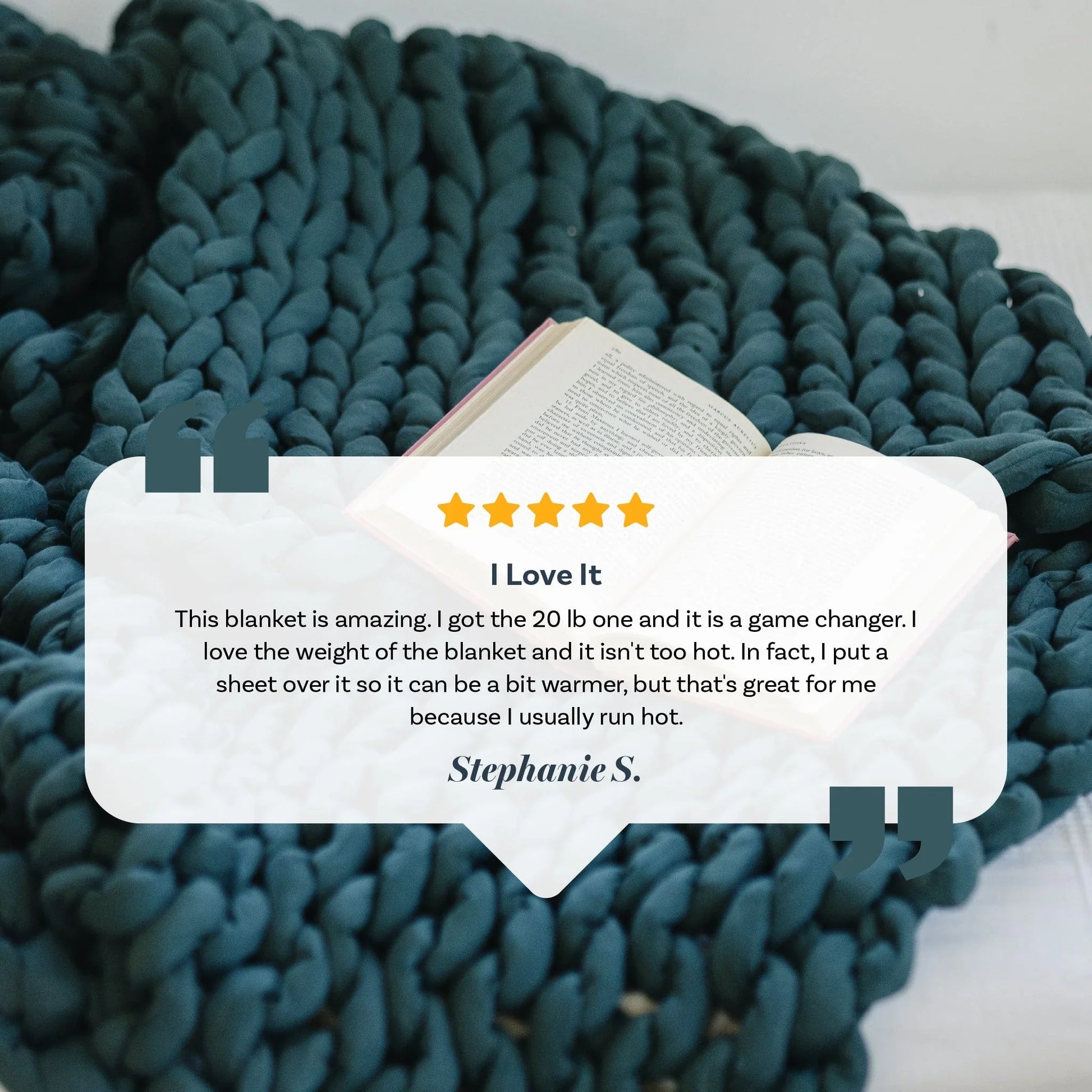 Forest green chunky knit weighted blanket on bed with open book and customer review.
