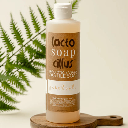 16 oz patchouli probiotic vegan castile soap bottle with fern leaf background