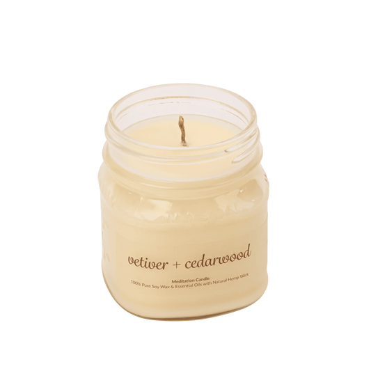 Vetiver cedarwood soy wax meditation candle with essential oils in a glass jar