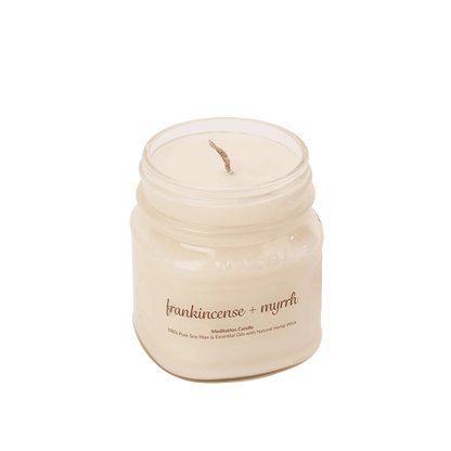 Frankincense and myrrh meditation soy wax candle in a clear glass jar