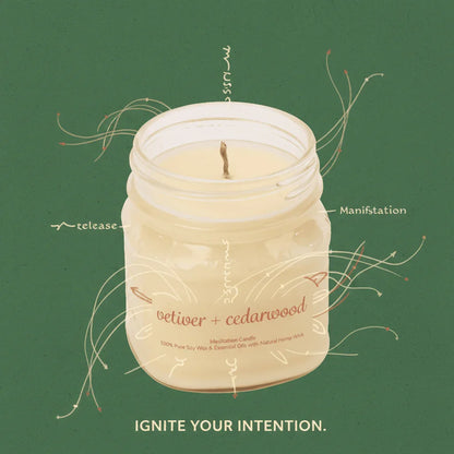 Vetiver and cedarwood meditation candle in a glass jar, labeled for mindfulness and intention.