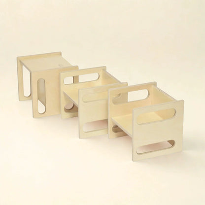 Adjustable wooden cube chair shown at different height positions on a neutral background
