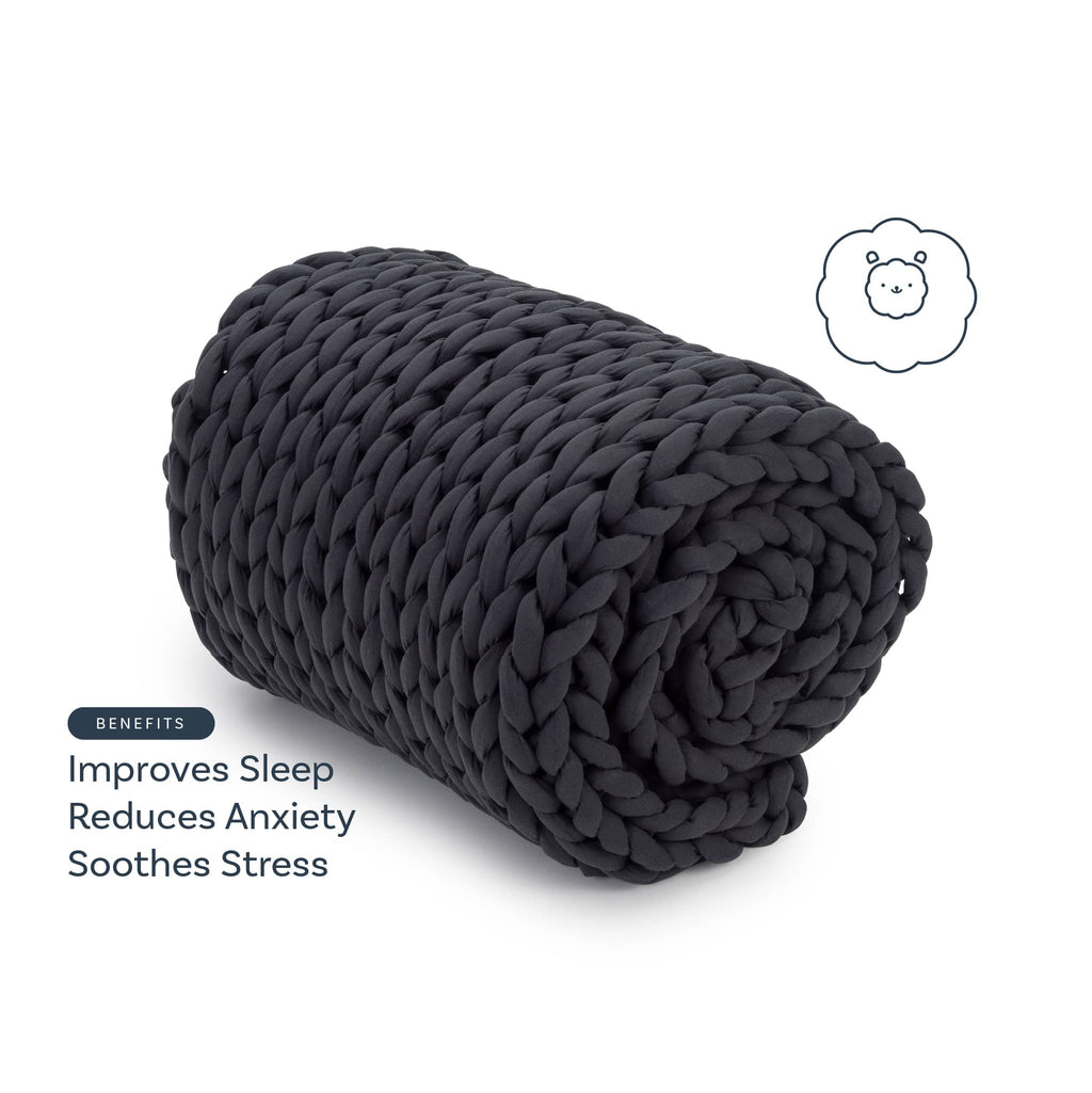 Black knitted blanket on a white background with text about benefits.