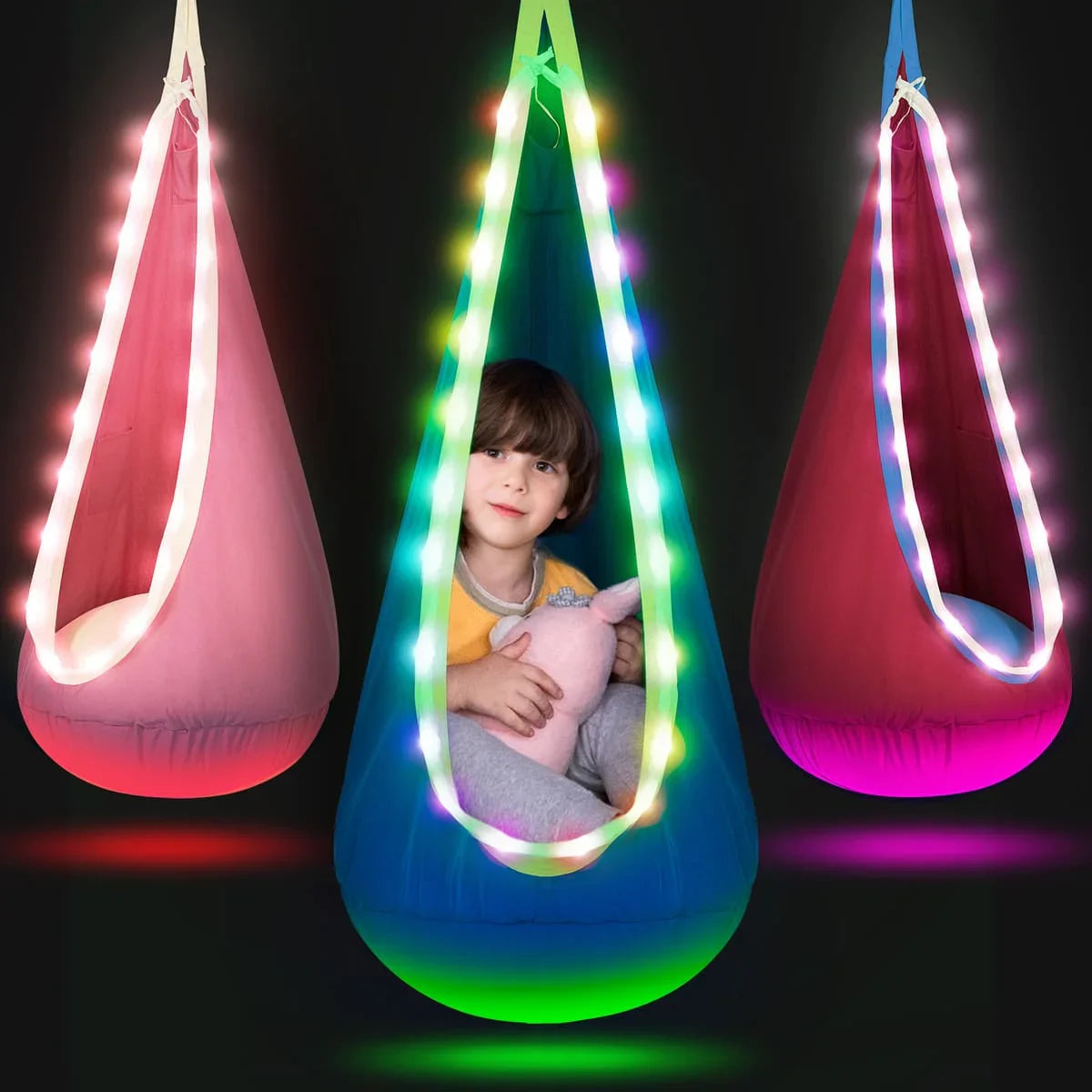 Colorful sensory swing pods with LED lights, child sitting inside cozy hammock chair