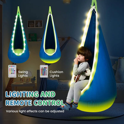 Sensory pod swing with LED lights and remote control, child sitting inside in cozy bedroom