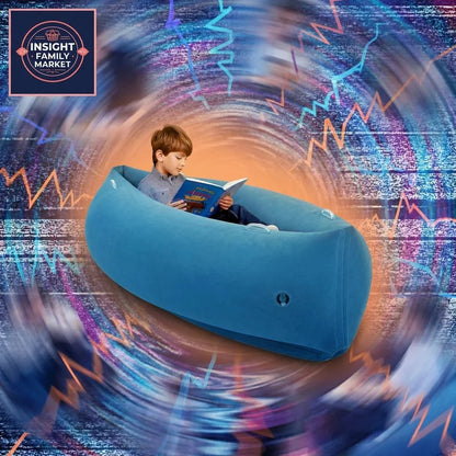 Child reading in a sensory-friendly inflatable seat with colorful abstract background