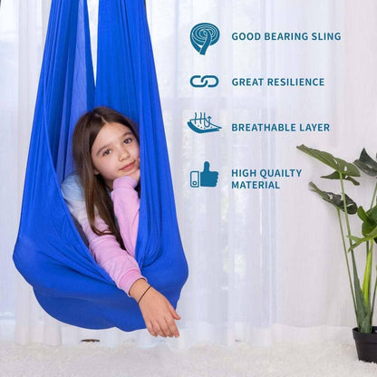 Child in blue sensory swing hammock indoors, with icons showing features like breathable, resilient fabric.