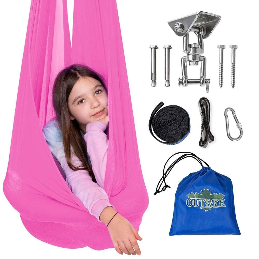Child in pink sensory swing hammock with installation hardware and blue storage bag
