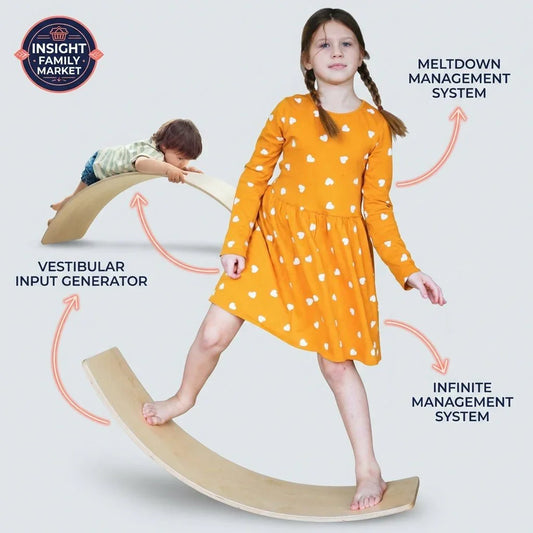 Kids using a wooden sensory balance board, labeled for vestibular and sensory input.